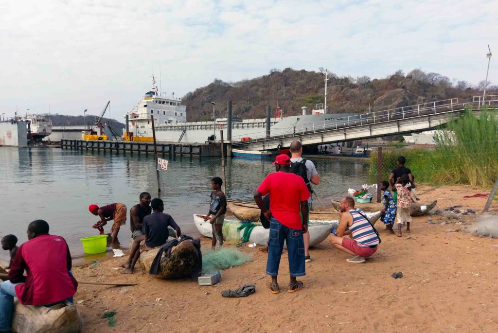 This is the harbour of Monkey Bay at Cape Maclear in Malawi. Ilala Ferry is starting from there. Besides that the locals prepare their boats for fishing.