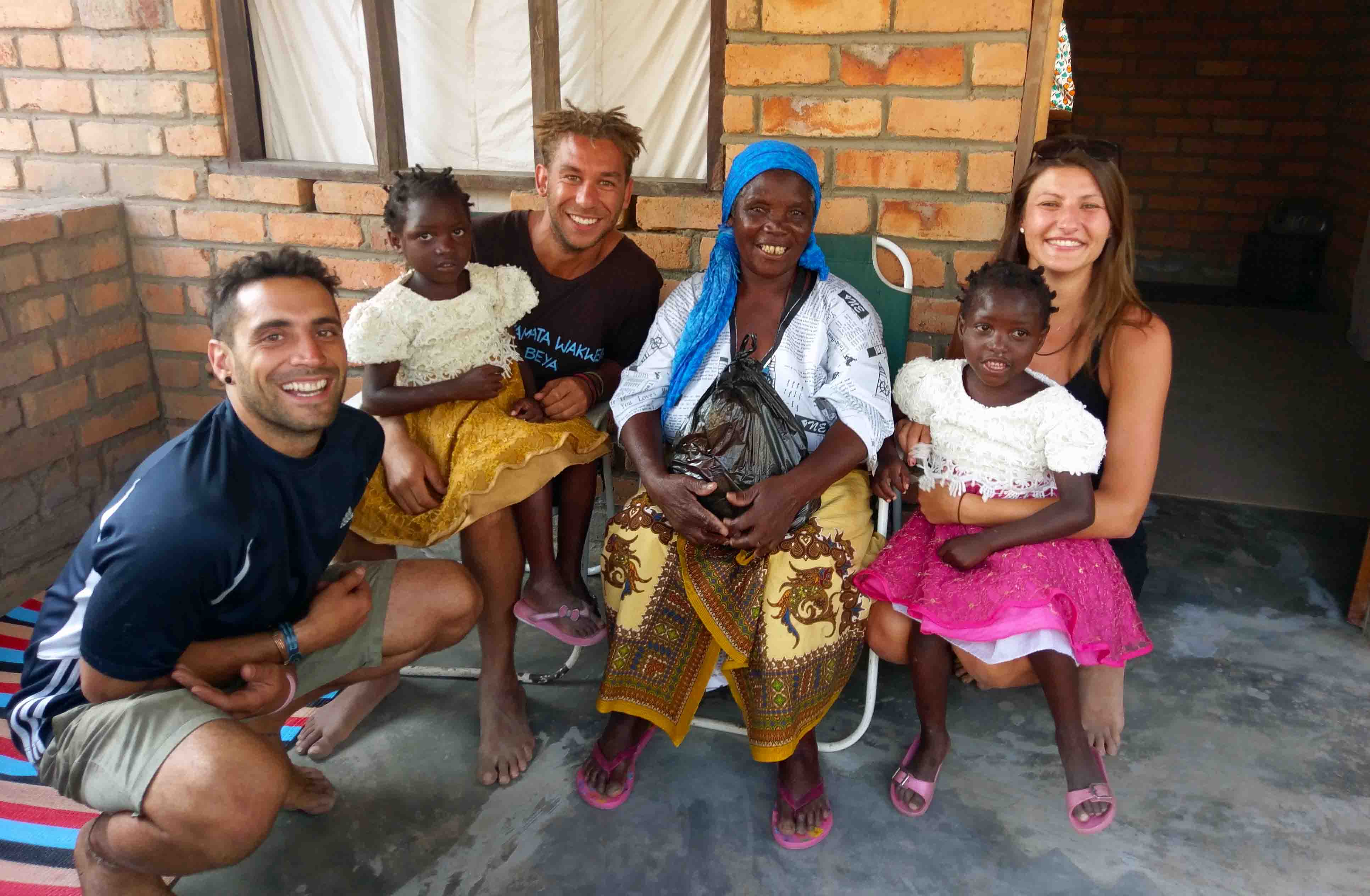 This is a house in a small village in Malawi. The old lady is the grandmother of a friend and she invited us to her house for dinner.